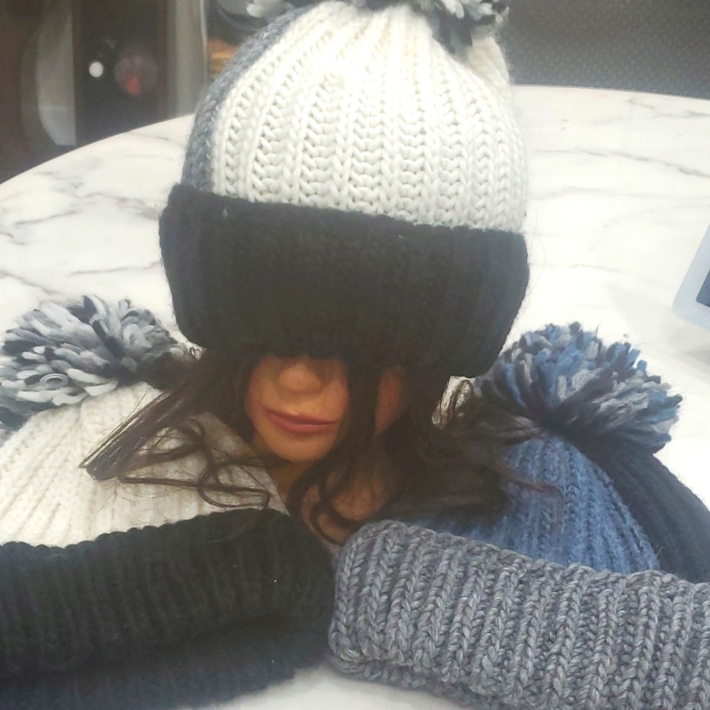 Hats with pom pom